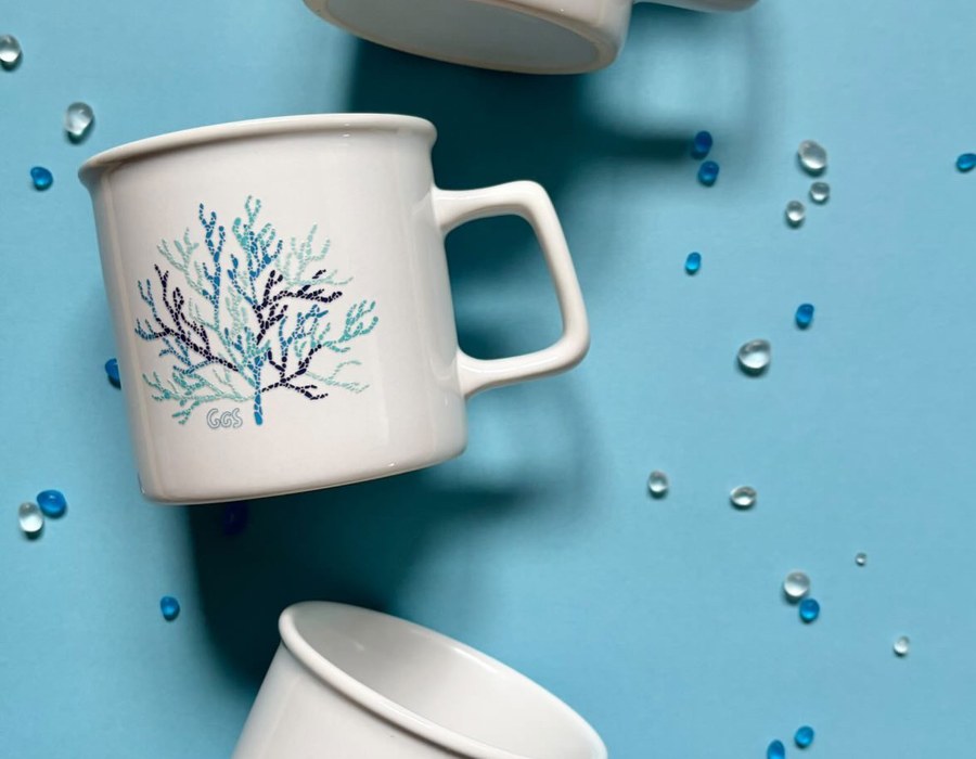 GGS illustrated mugs with island-inspired designs