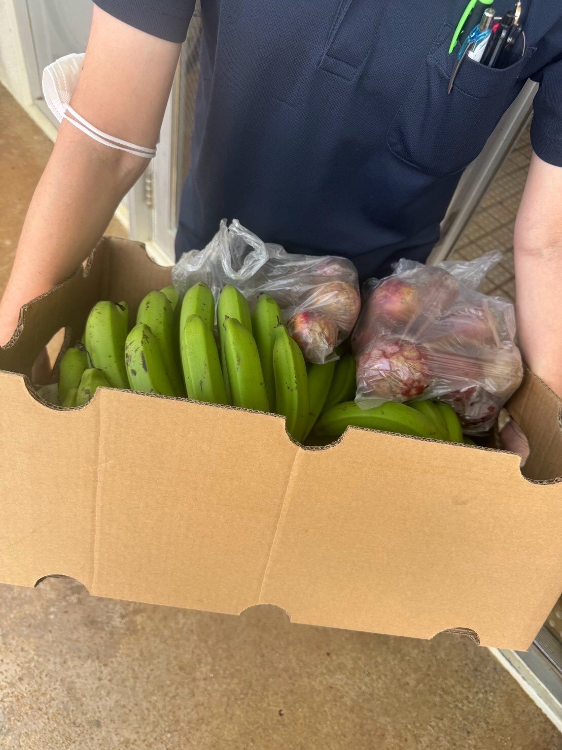 Bananas being shared through community support