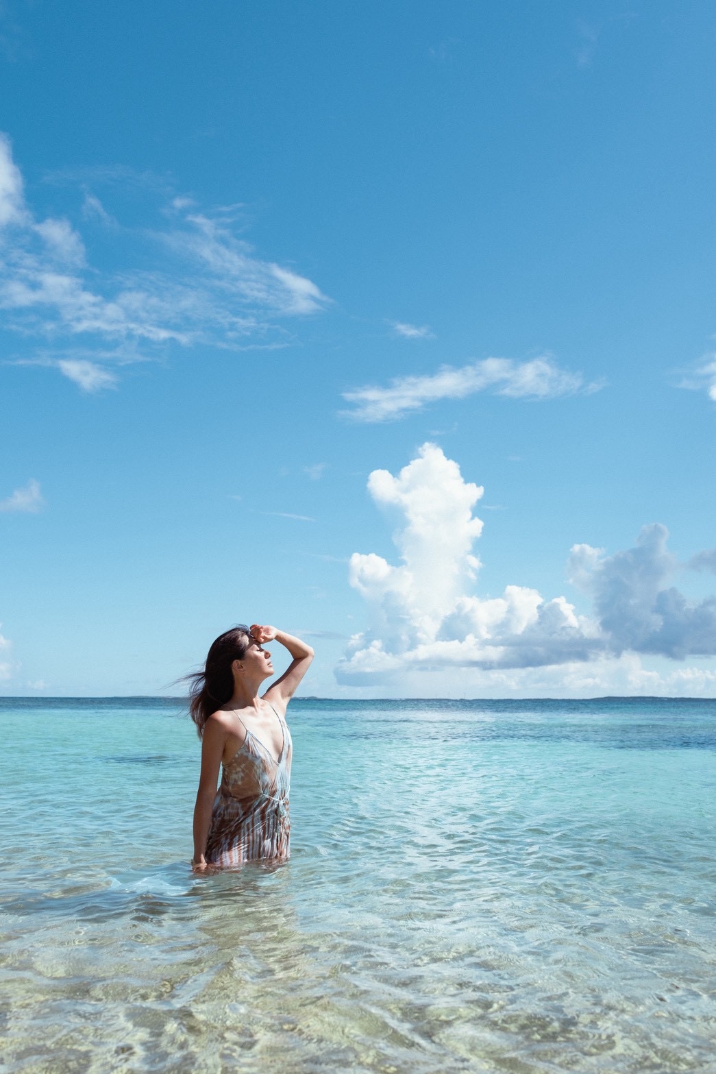 Ran standing in the clear sea of Miyakojima